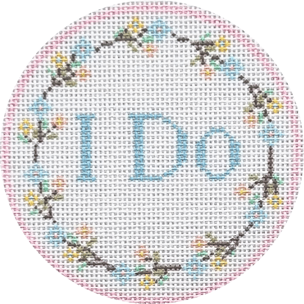Circular needlepoint canvas with 'I Do' text and floral border